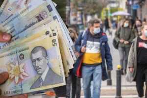 bani romani - Ajutor de 1.400 de lei de la Guvern pentru încălzire și curent!