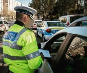 politist roman - Doi polițiști din Pitești au fost condamnați la închisoare! Luau mită de la șoferi