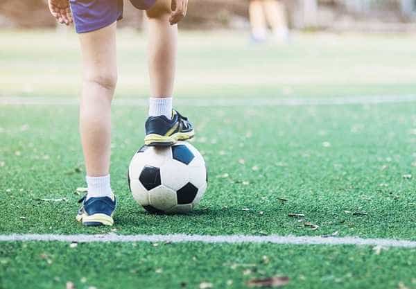 boy-standing-with-ball-football-field-ready-start-play-new-game–crop-1691507875