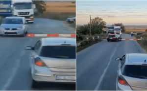 K2pIVTSVC4R 3L - Șoferi inconștienți! Au traversat calea ferată deși bariera era coborâtă